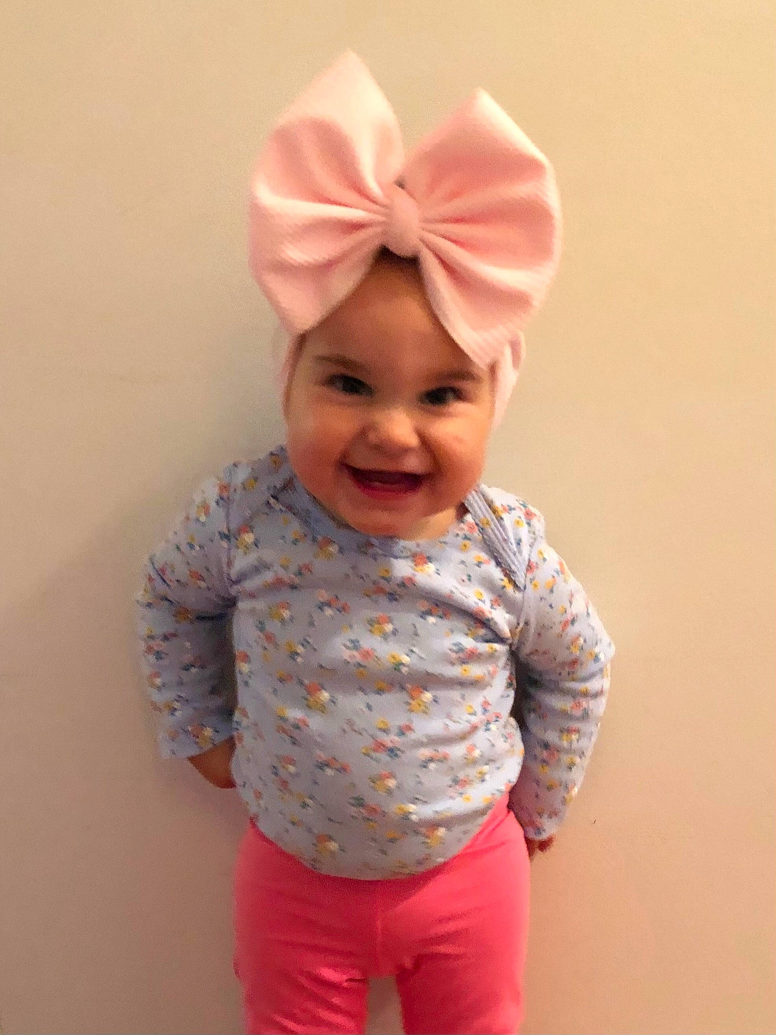 Lillia joined the competition — help win amazing prizes! baby, baby_toddler_clothing, cap, chin, clothing, costume_hat, eye, face, gesture, hair, happy, head, headgear, headwear, human_body, joy, neck, person, pink, shirt