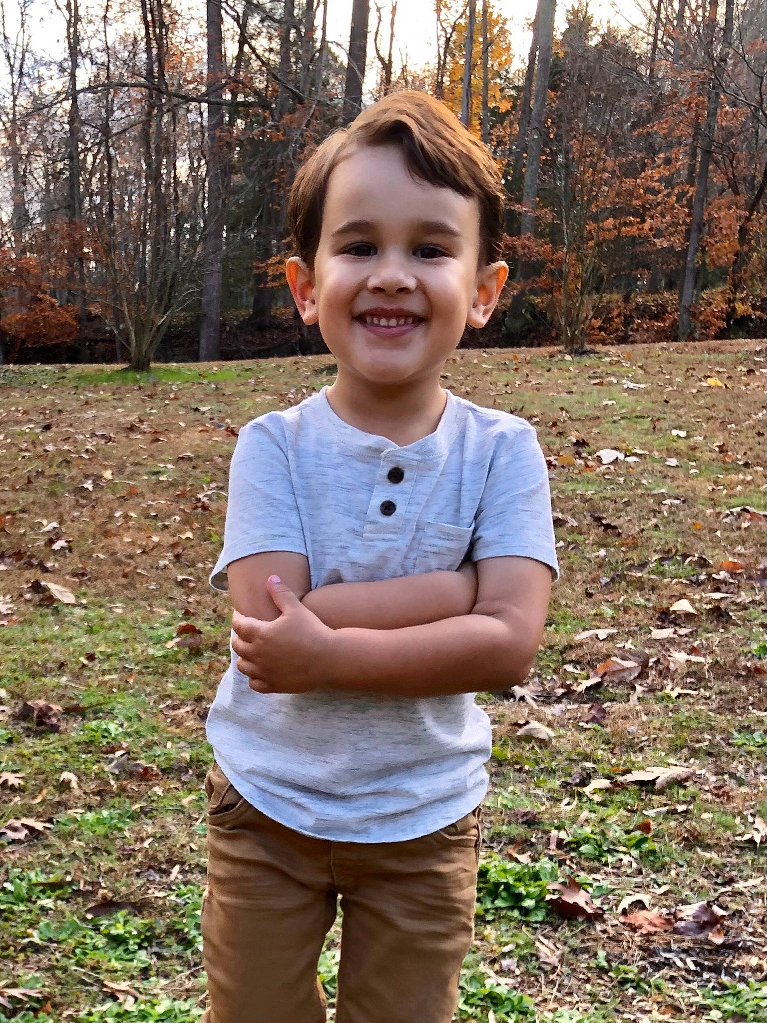 Sawyer is registered to the contest to win money with this photo: botany, chin, clothing, electric_blue, face, fun, grass, grass_family, happy, head, human_body, joy, leisure, people_in_nature, person, plant, sleeve, smile, t_shirt, toddler