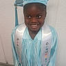 Arianna joined the competition — help win amazing prizes! child, smiling, graduation, preschool, cap, gown, tassel, indoor, floor, wall, young, person, portrait, celebration, happy, standing, clothing, footwear, black_shoes, achievement