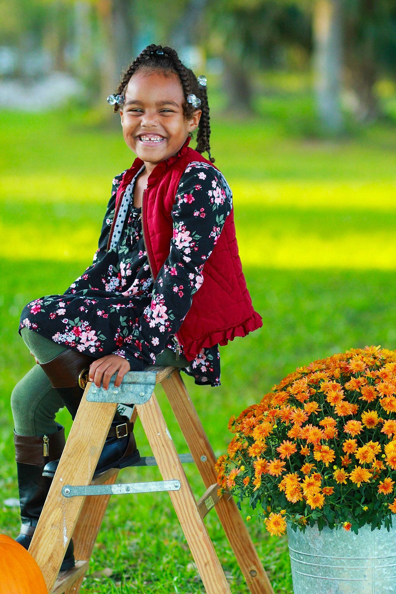 Krislynn is registered to the contest to win money with this photo: annual_plant, botany, event, facial_expression, flower, fun, grass, groundcover, happy, joy, leaf, leisure, nature, orange, people_in_nature, person, petal, plant, recreation, smile