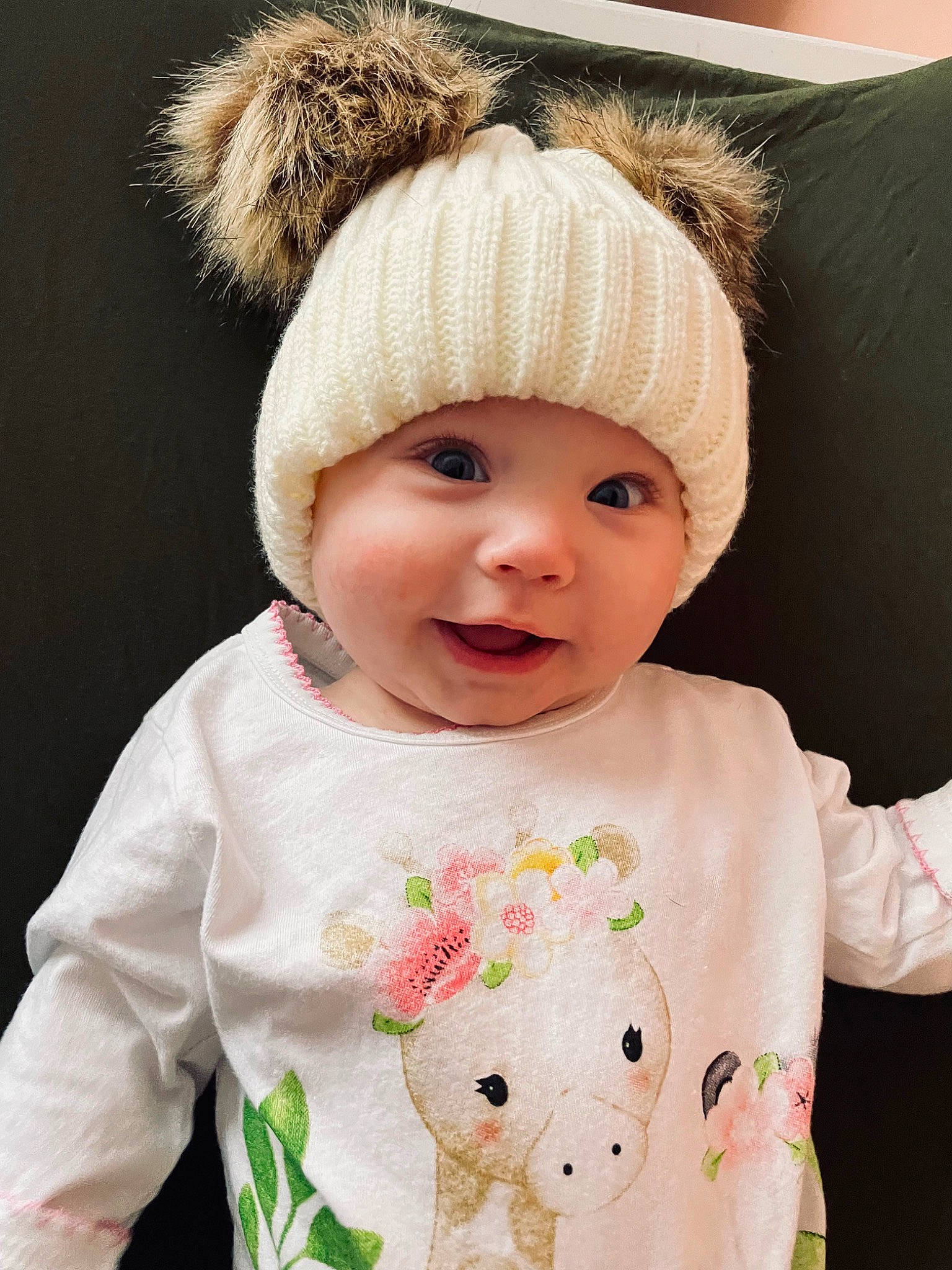 Hadley is registered to the contest to win money with this photo: baby_toddler_clothing, beauty, cap, cheek, child, clothing, eyelash, face, facial_expression, happy, headgear, headwear, joy, lip, outerwear, person, pink, skin, sleeve, smile