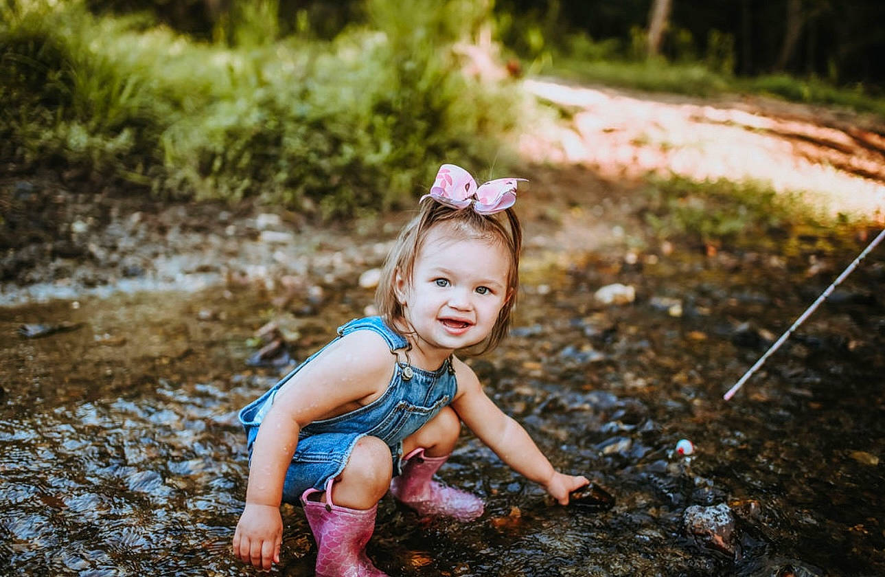 Blakely is registered to the contest to win money with this photo: baby_toddler_clothing, beauty, child, flash_photography, forest, fun, grass, happy, joy, landscape, leaf, leisure, nature, people_in_nature, person, plant, smile, soil, summer, sunlight