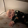 Grayson joined the competition — help win amazing prizes! baby, infant, sleeping, child, portrait, indoors, bed, mattress, blanket, pajamas, patterned, cozy, resting, lying_down, face, hand, closed_eyes, dim_lighting, home, photography