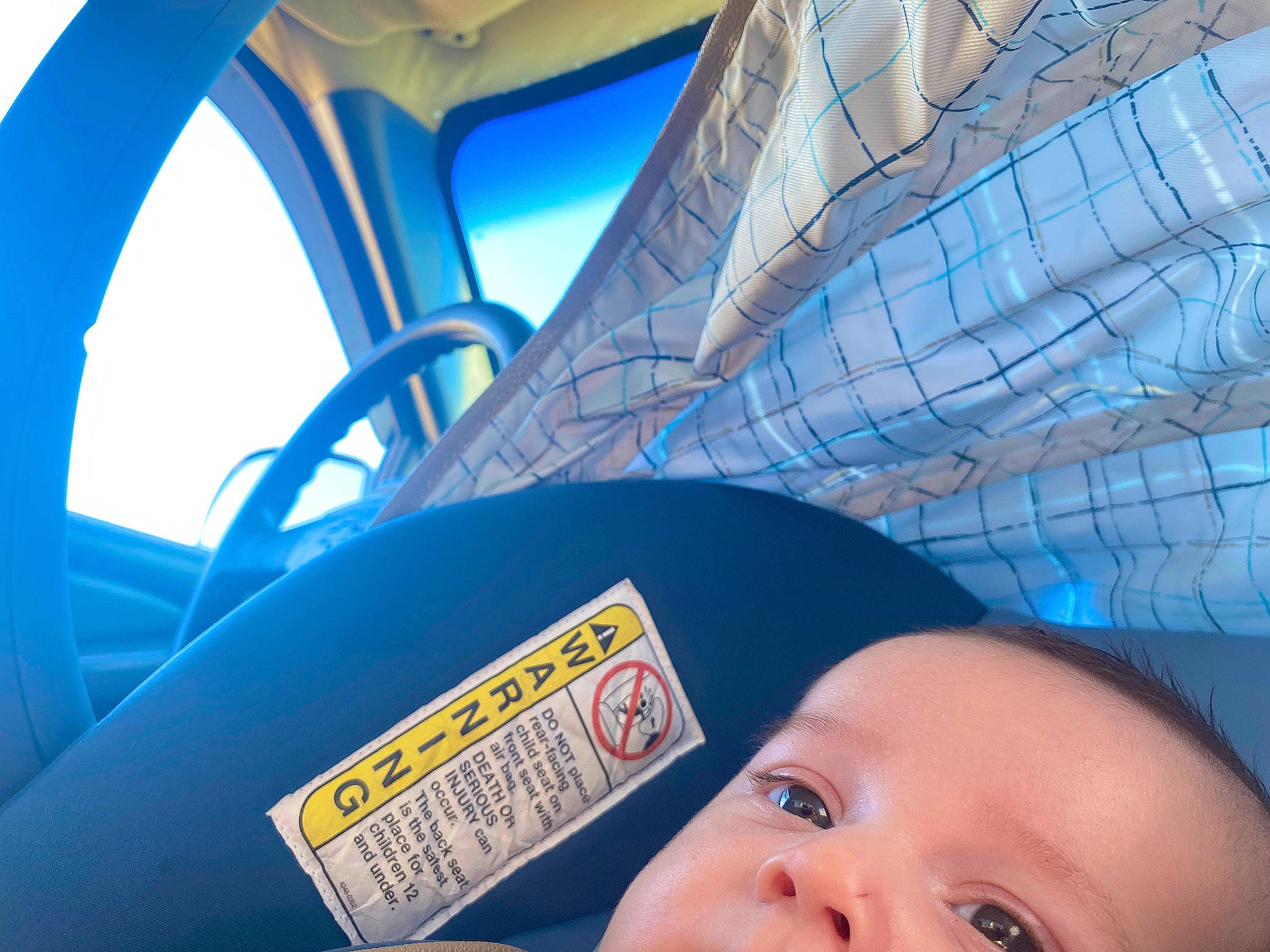 Lliam joined the competition — help win amazing prizes! auto_part, automotive_wheel_system, baby, baby_products, child, electric_blue, eye, eyebrow, fun, happy, human_leg, leisure, nose, person, recreation, skin, sky, steering_wheel, toddler, travel