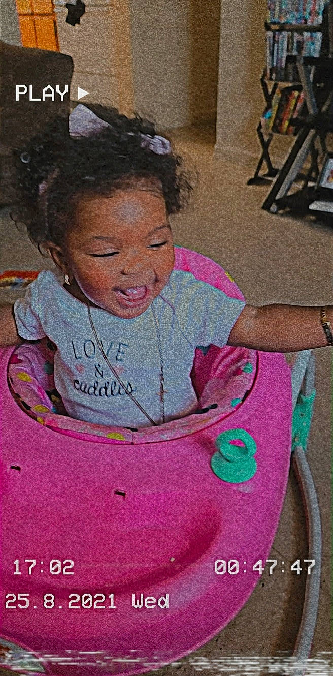 Ma'Kayla joined the competition — help win amazing prizes! arm, child, cool, eye, face, facial_expression, fun, hairstyle, happy, head, leisure, motor_vehicle, mouth, person, pink, skin, smile, t_shirt, tire, toddler