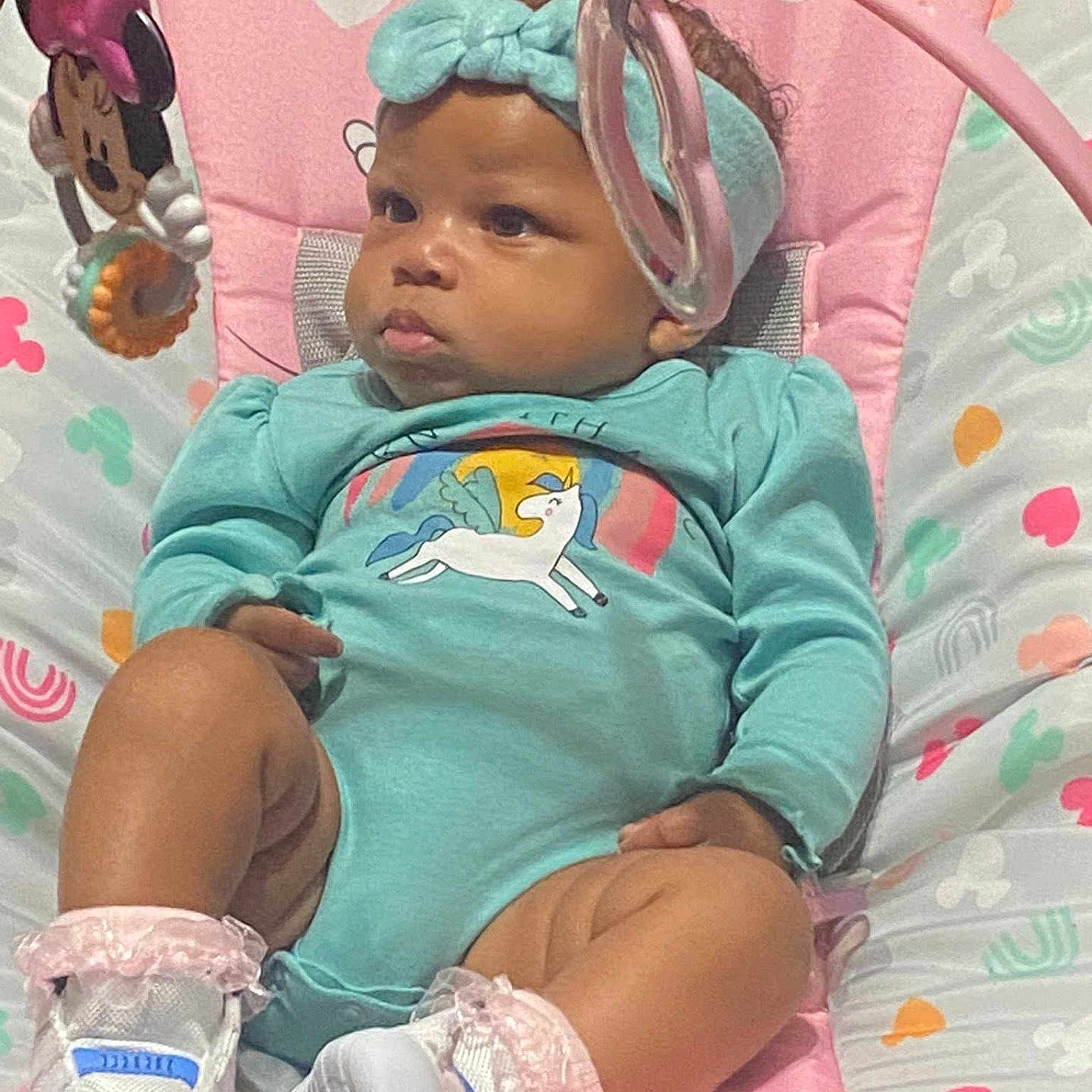 Amillion joined the competition — help win amazing prizes! baby, baby_seat, child, curious, cute, footwear, headband, indoors, infant, minnie_mouse, onesie, patterned, pink, playtime, shoes, sitting, soft_toys, toy, turquoise, unicorn