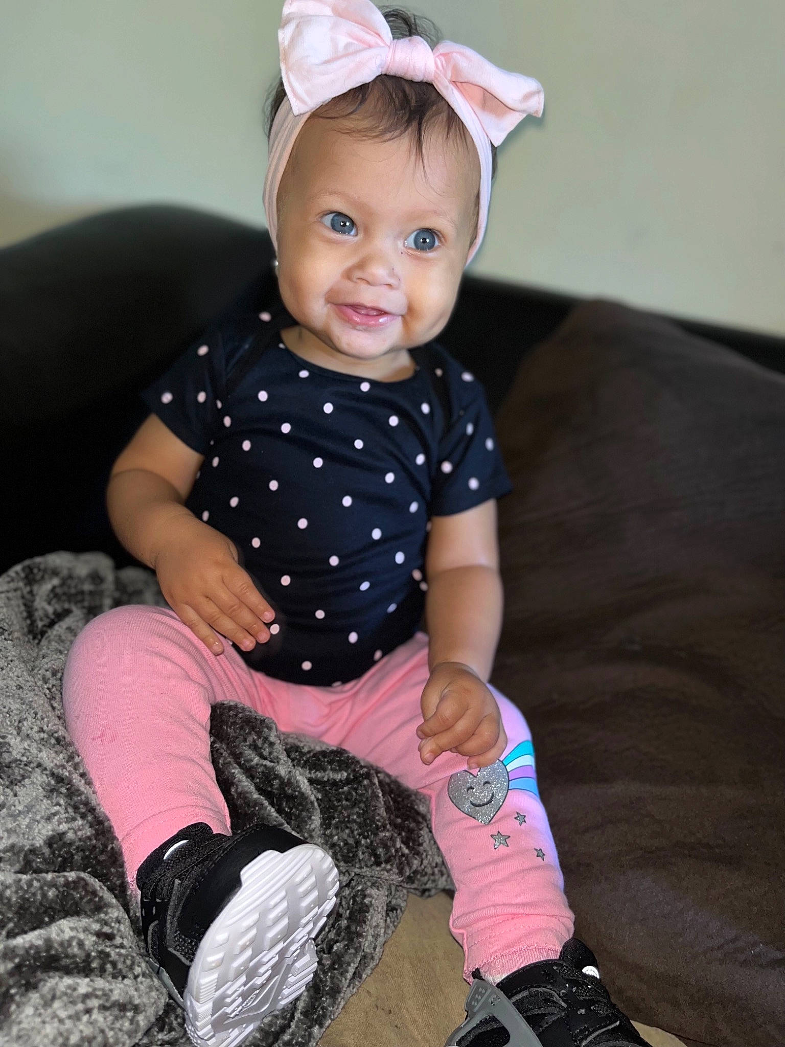 Jaliyah is registered to the contest to win money with this photo: arm, baby_toddler_clothing, child, cool, dress, fashion, finger, footwear, happy, human, knee, leg, person, pink, purple, skin, sleeve, smile, sock, thigh