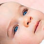 Maël a rejoint le concours — aidez-le/la à gagner de superbes lots ! baby, blue_eyes, child, closeup, cute, expression, eyelashes, face, head, health, human, infant, innocence, looking_up, newborn, pink_background, portrait, skin, soft_light, young