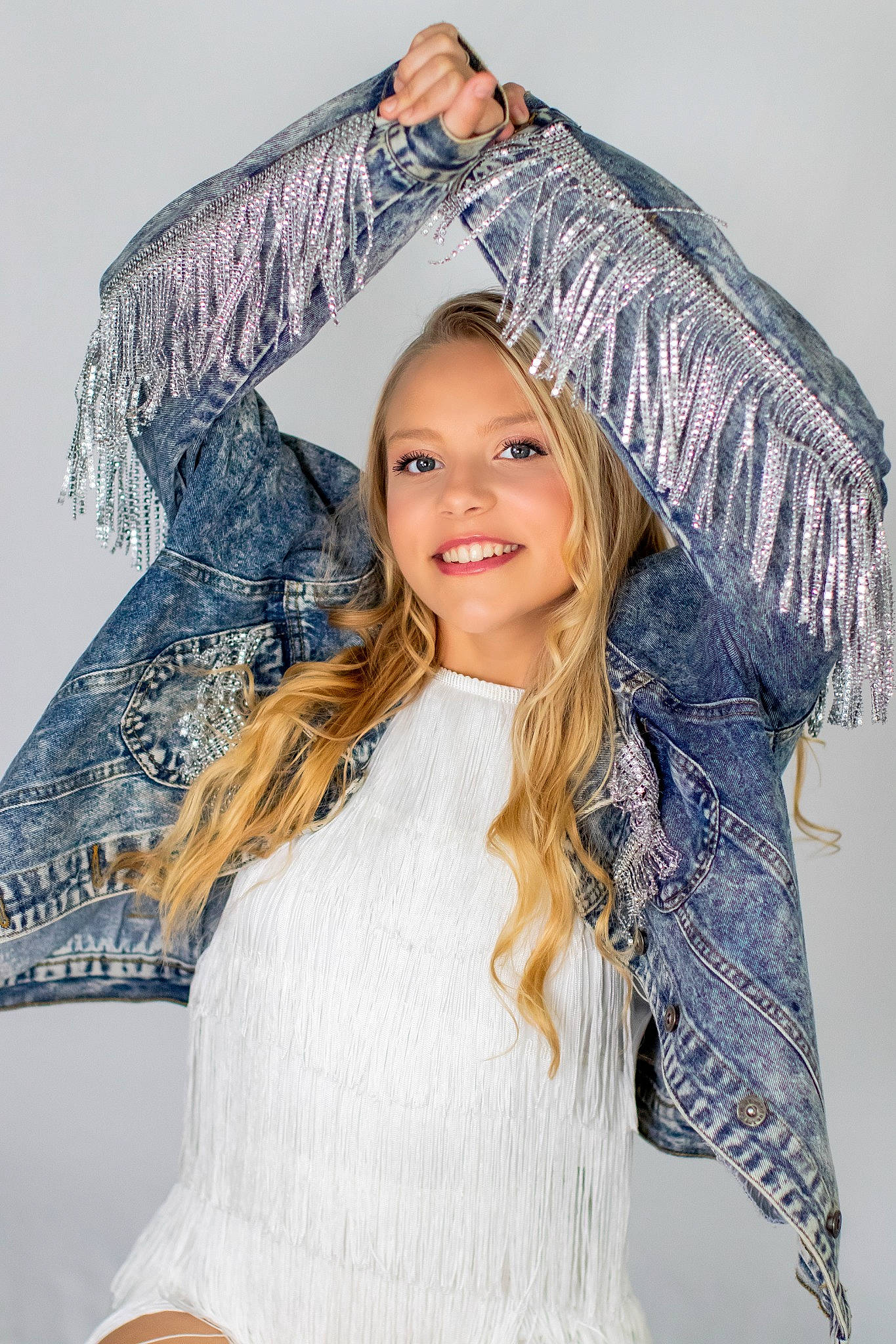 Kailie is registered to the contest to win money with this photo: blond, brown_hair, cap, costume_hat, electric_blue, event, eyebrow, eyelash, fashion_design, fun, gesture, happy, headgear, headpiece, joy, long_hair, makeover, outerwear, person, sleeve