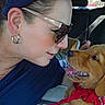 Rocky joined the competition — help win amazing prizes! woman, dog, golden_dog, pet, car, car_interior, sunglasses, headband, earring, red_bandana, smiling, tongue, closeup, portrait, affection, kiss, road_trip, seated, daylight, happy