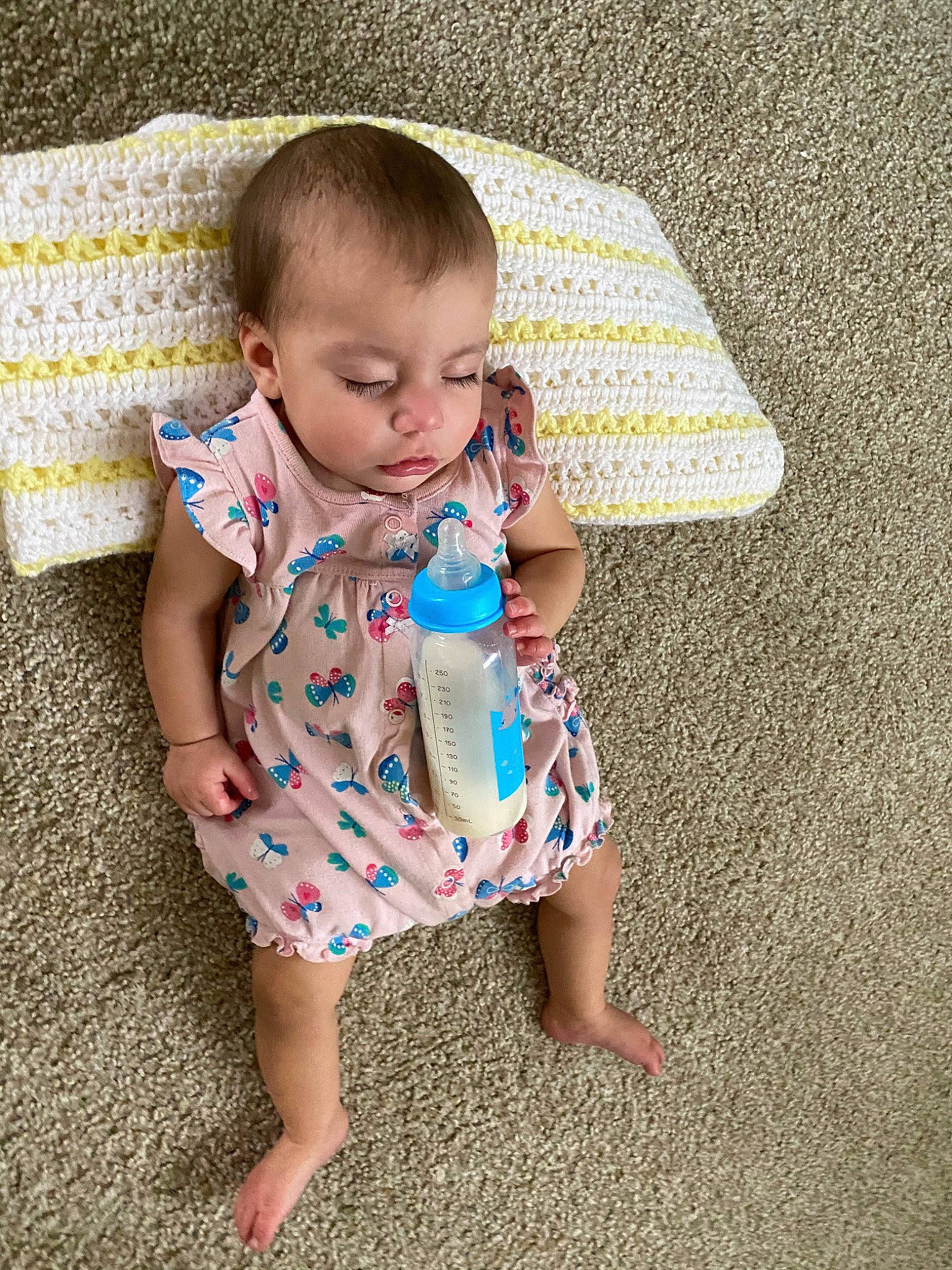 Georgia Mae is registered to the contest to win money with this photo: baby, baby_toddler_clothing, child, dress, pattern, person, play, product, sitting, skin, toddler, vacation