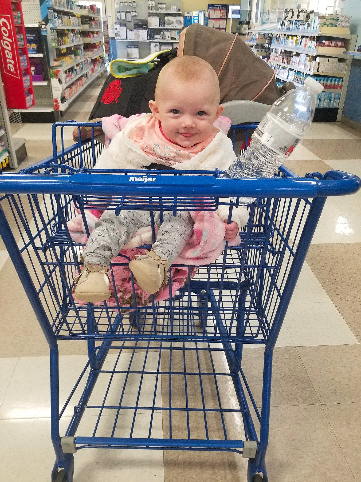 Oaklynn is registered to the contest to win money with this photo: chair, child, furniture, joy, person, product, shopping_cart, table, toddler, vehicle
