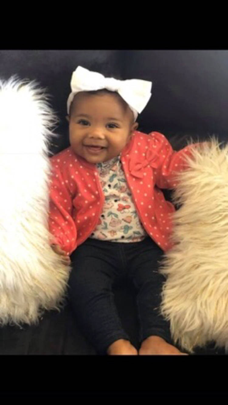 Leilahni is registered to the contest to win money with this photo: baby, child, companion_dog, ear, fur, fur_clothing, happy, head, headgear, human, joy, nose, outerwear, person, skin, smile, toddler