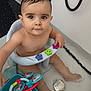 Wissam participe au concours pour gagner de l'argent avec cette photo : baby, bath, bathtub, bath_toys, child, cute, face, fun, indoor, person, playful, plastic, seat, sitting, toy, water, wet_hair, young_child, toddler, bathroom