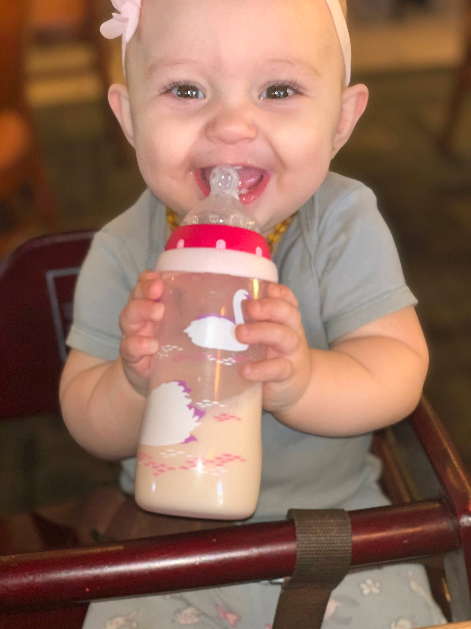 Zoella is registered to the contest to win money with this photo: baby, baby_bottle, baby_food, baby_products, child, drink, drinking, drinkware, joy, person, product, smile, toddler