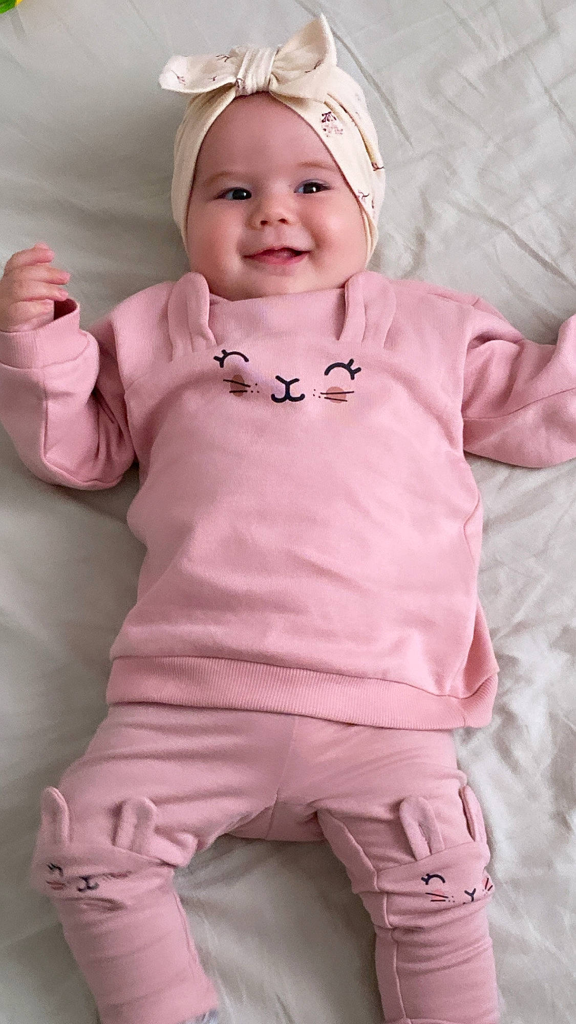 Ohana a rejoint le concours — aidez-le/la à gagner de superbes lots ! arm, baby_toddler_clothing, cheek, chin, eye, face, hand, happy, head, headwear, human_body, joy, lip, neck, outerwear, person, product, purple, shoulder, skin