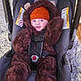 Brody is registered to the contest to win money with this photo: baby, child, car_seat, fur_costume, orange_hat, cozy, indoor, infant, cute, smiling, seat_belt, plush, warm_clothing, person, portrait, baby_clothes, soft_texture, car_seat_harness, toddler, happy