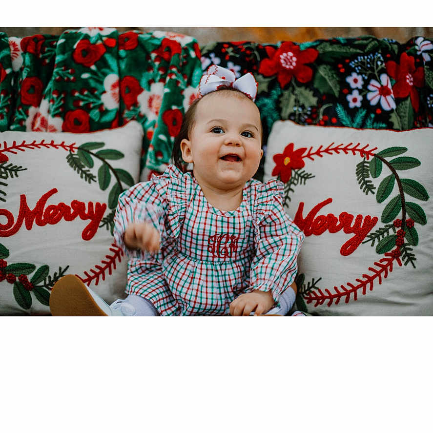 Gabriella joined the competition — help win amazing prizes! baby, bodypart, couch, cushion, electronics, face, finger, hand, happy, head, homedecor, laughing, newborn, pattern, person, photography, portrait, screen, smile, text