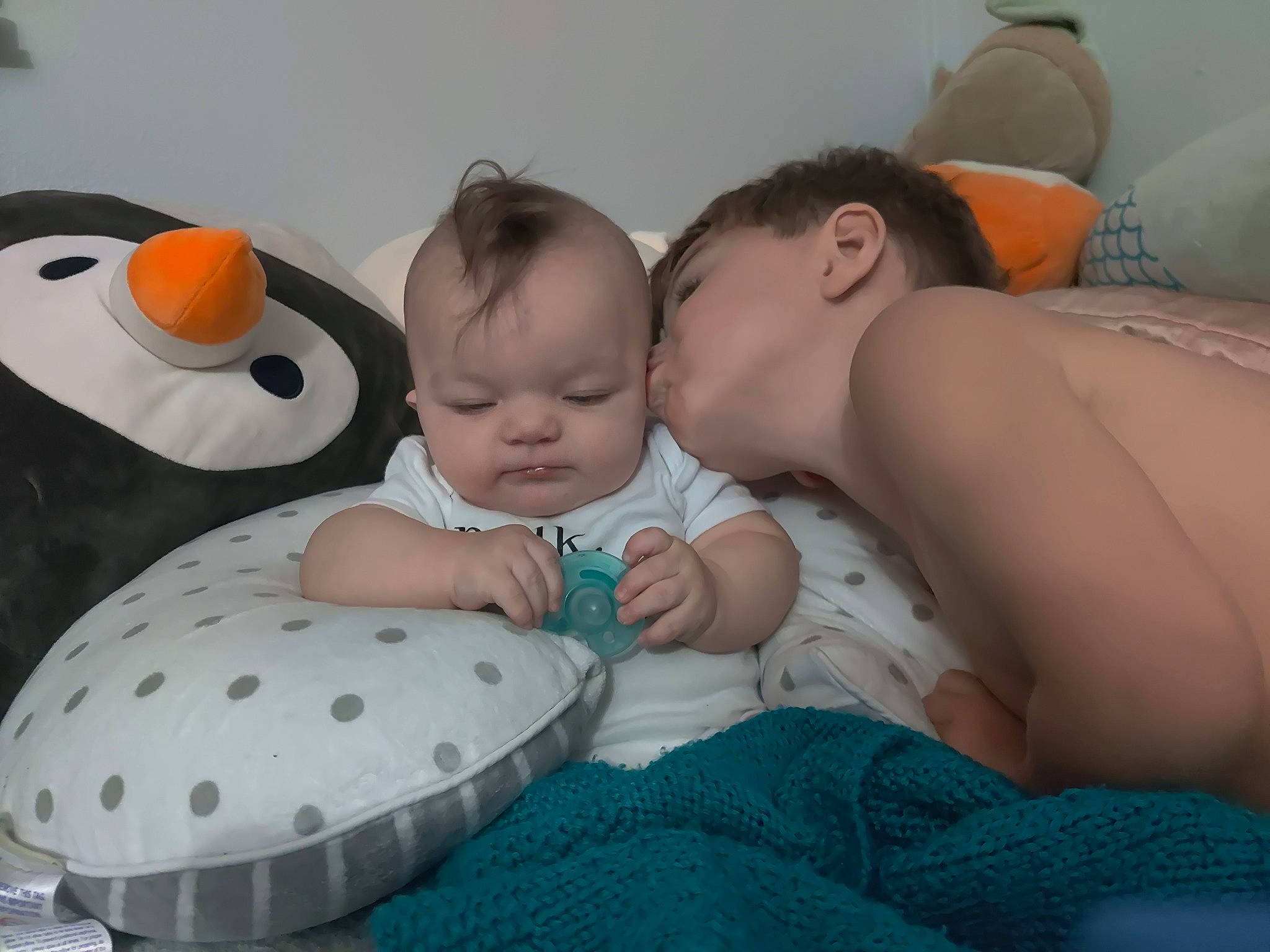 Xane joined the competition — help win amazing prizes! baby, baby_products, baby_toddler_clothing, bedding, bedtime, cheek, child, comfort, facial_expression, fun, happy, head, linens, organ, pattern, person, room, sitting, skin, textile