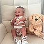 Azaylen joined the competition — help win amazing prizes! baby, child, smiling, sitting, plush_chair, stuffed_animal, toy_dog, shoes, romper, happy, indoor, cute, infant, cozy, furniture, portrait, person, soft_texture, comfortable, small