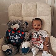 Azaylen joined the competition — help win amazing prizes! baby, teddy_bear, chair, plush, smiling, white_clothing, sneakers, celebration, heart, cute, indoor, child, happy, gift, love, cozy, portrait, infant, sitting, cute_outfit