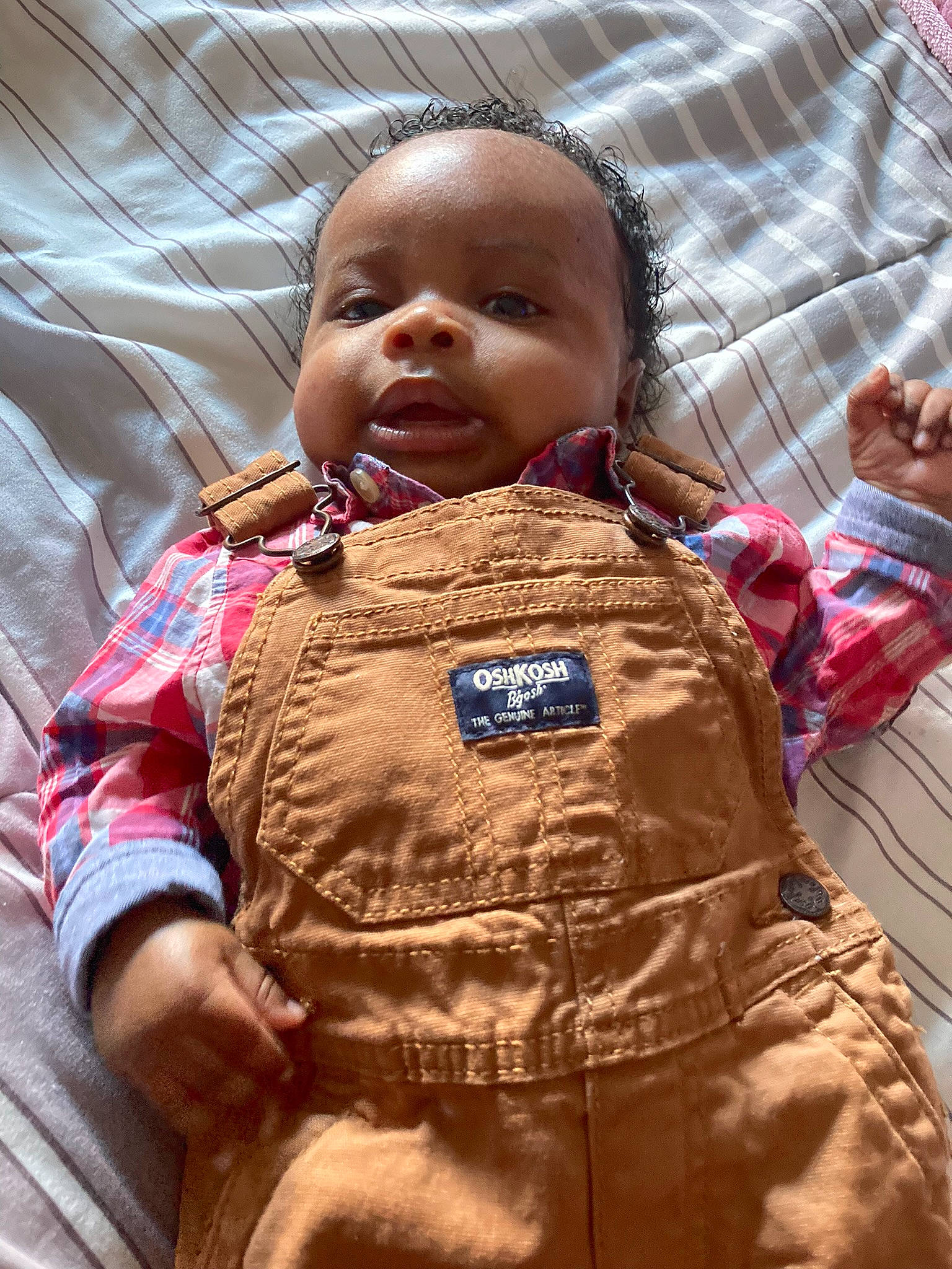 Brent joined the competition — help win amazing prizes! baby, baby_toddler_clothing, camouflage, child, comfort, facial_expression, gesture, happy, mammal, military_camouflage, military_person, military_uniform, nose, pattern, person, product, skin, sleeve, soldier, textile