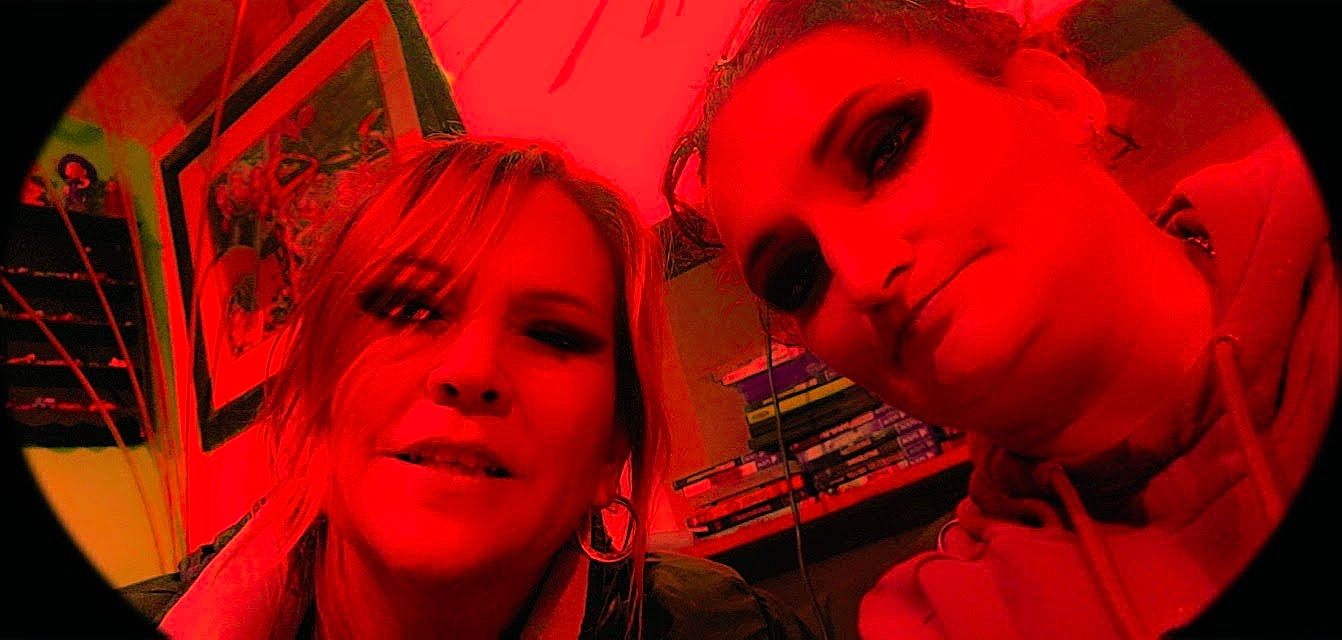 Chevelle is registered to the contest to win money with this photo: art, black, black_hair, entertainment, event, eyebrow, eyelash, eyewear, facial_expression, flash_photography, fun, happy, joy, lip, lipstick, magenta, mouth, nose, orange, person