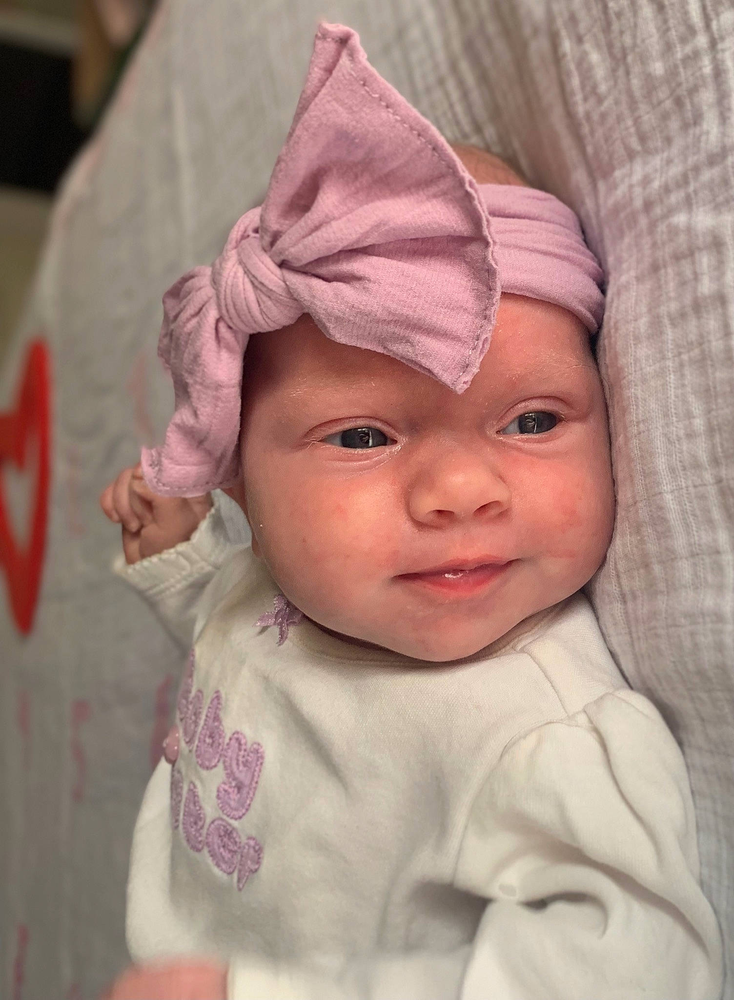 Rylie joined the competition — help win amazing prizes! baby, baby_toddler_clothing, cap, cheek, chin, comfort, eye, eyebrow, face, happy, head, headwear, linens, lip, magenta, nose, person, pink, skin, sleeve