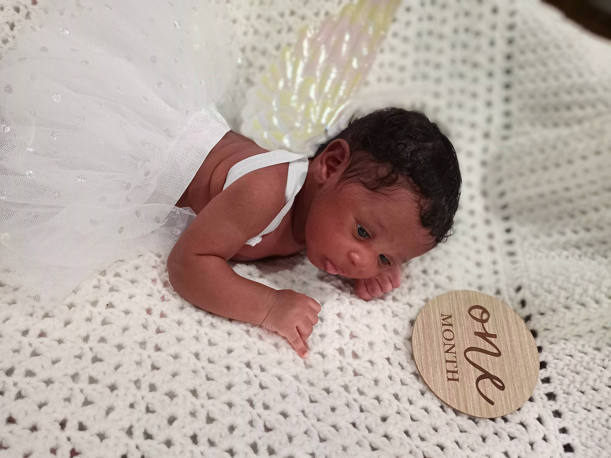 Deliah joined the competition — help win amazing prizes! baby, baby_products, baby_safety, baby_sleeping, baby_toddler_clothing, bedding, bedtime, child, comfort, finger, flooring, happy, linens, nail, pattern, person, room, skin, textile, toddler