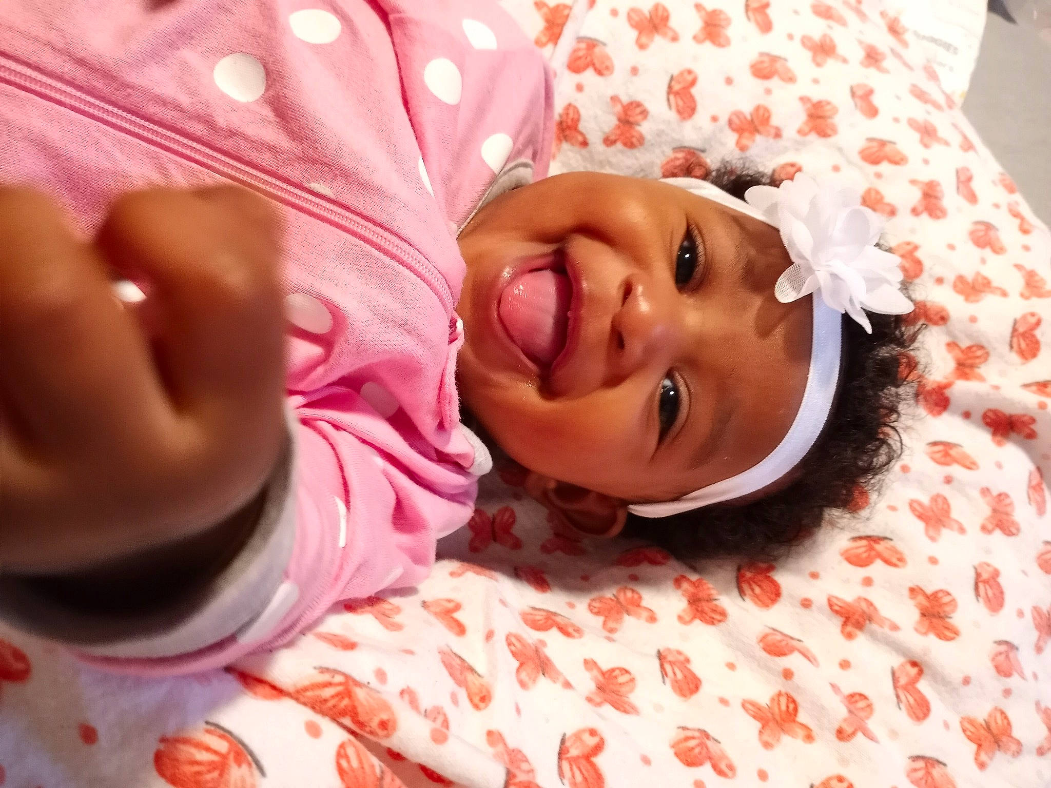 Deliah joined the competition — help win amazing prizes! baby, baby_toddler_clothing, bedding, bedtime, cheek, child, close_up, comfort, face, fun, happy, headwear, linens, lip, mouth, nose, person, pink, skin, sleeve