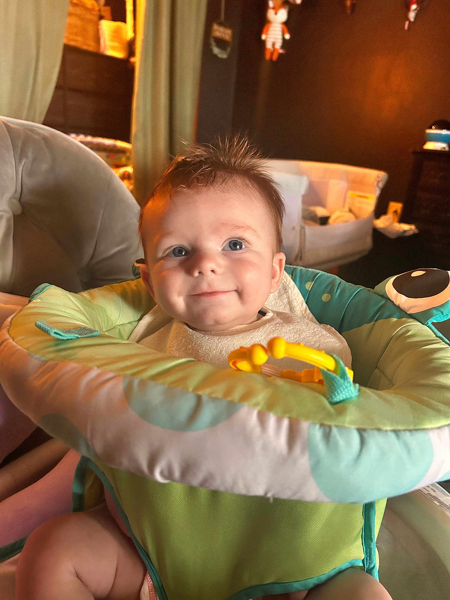 August joined the competition — help win amazing prizes! baby, child, smiling, indoor, seat, toy, cute, happy, face, infant, childcare, furniture, home, person, portrait, baby_seat, colorful, young_child, expression, baby_toy