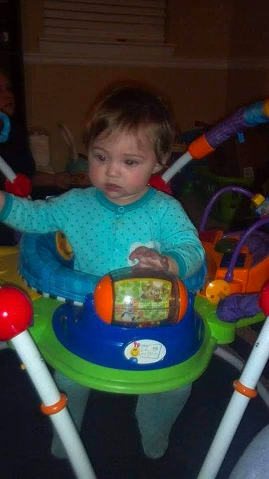 Linsie is registered to the contest to win money with this photo: baby, baby_products, baby_toddler_clothing, baby_toys, chair, child, electric_blue, fun, person, plastic, play, riding_toy, room, sharing, sitting, toddler, toy, toy_vehicle