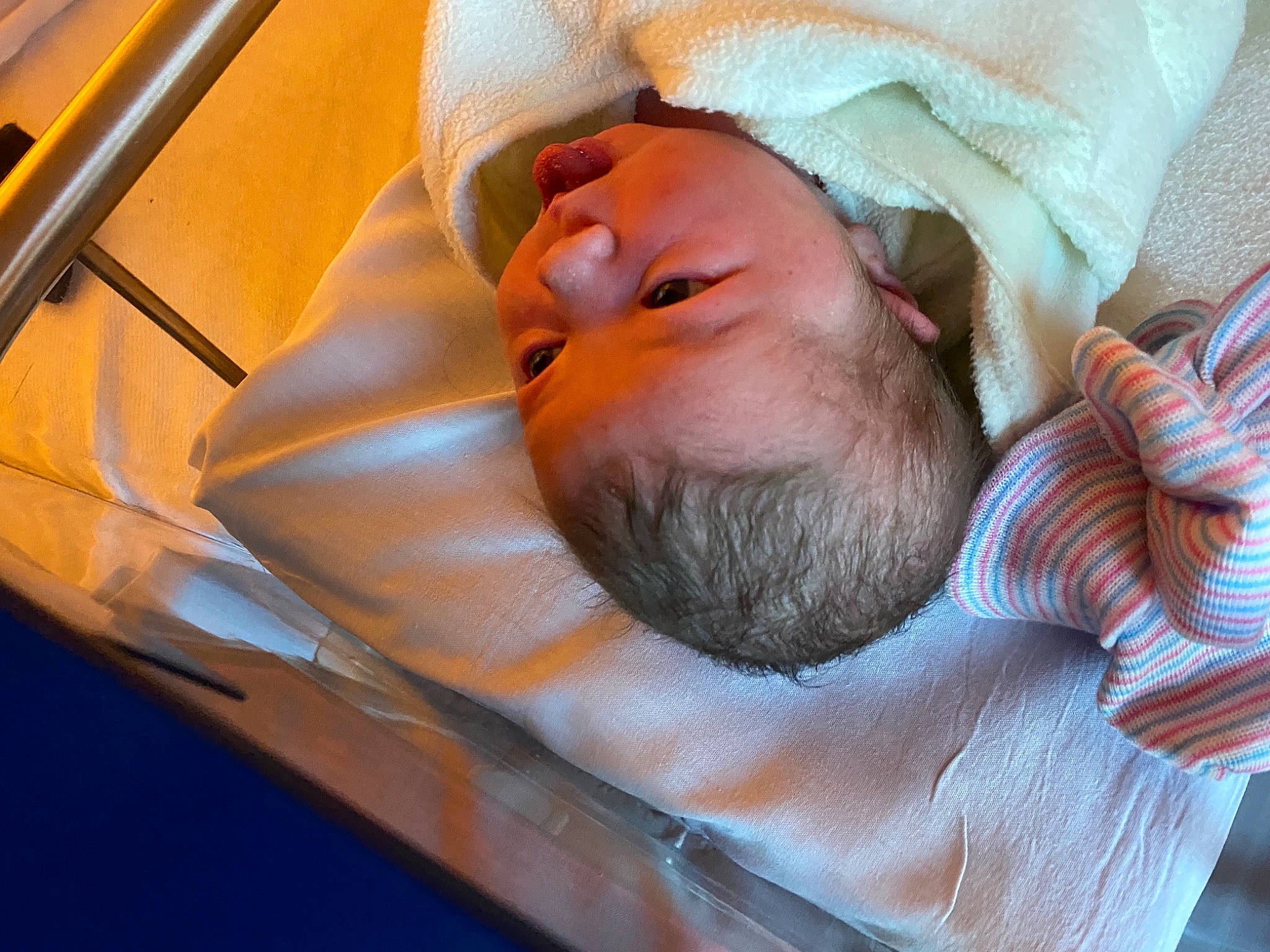 Kaisley joined the competition — help win amazing prizes! automotive_exterior, baby, baby_products, baby_sleeping, baby_toddler_clothing, beard, bedtime, cheek, child, comfort, eyebrow, hat, linens, nap, nose, orange, person, room, sleep, toddler