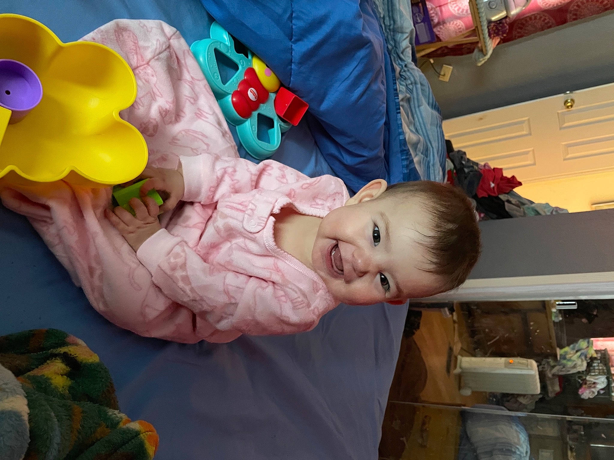 Scarlette is registered to the contest to win money with this photo: baby, baby_products, baby_toddler_clothing, baby_toys, balloon, cheek, child, comfort, fun, happy, joy, person, petal, play, room, sitting, toddler, toy