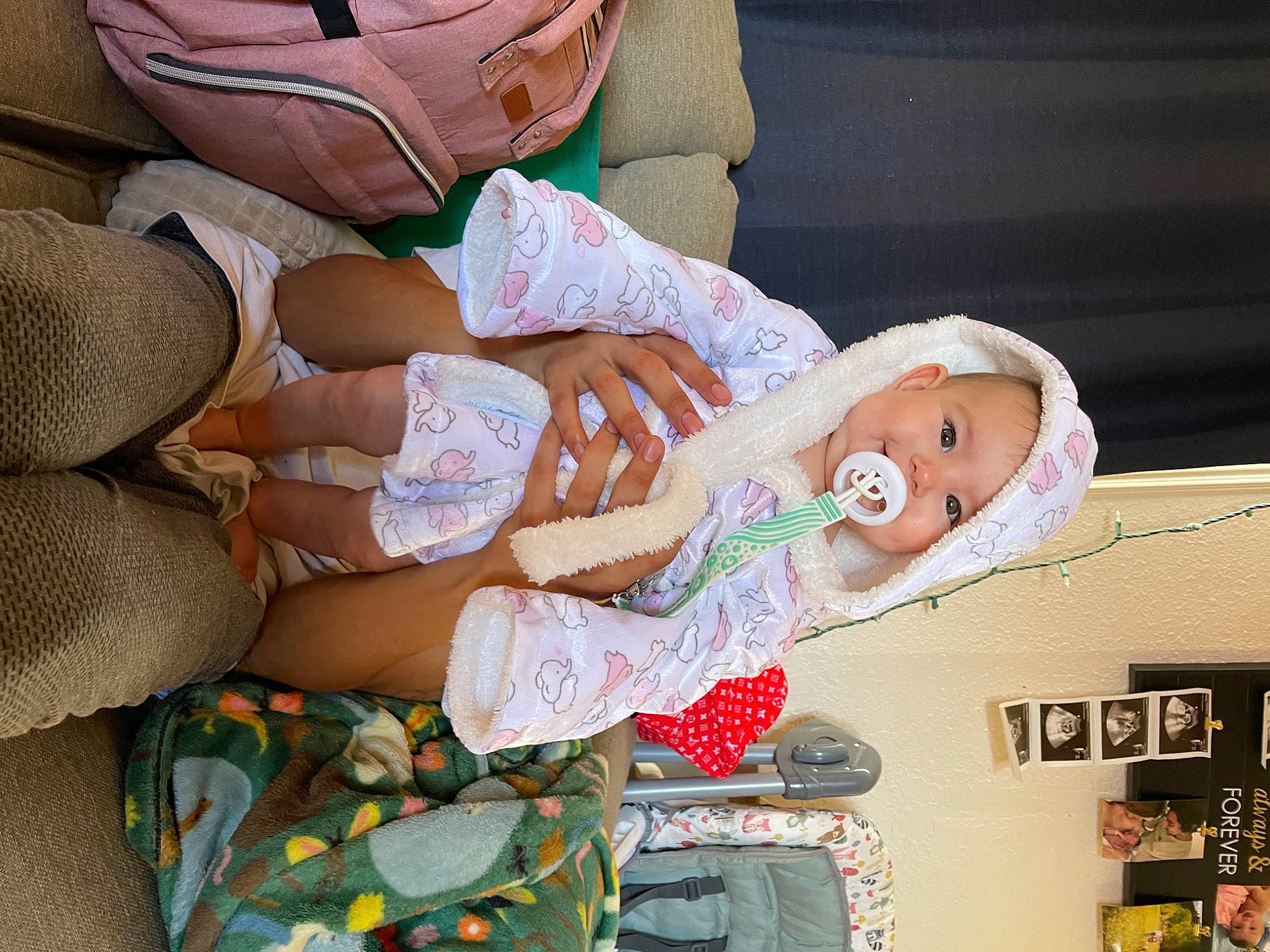 Scarlette is registered to the contest to win money with this photo: baby, baby_products, baby_toddler_clothing, child, comfort, event, finger, happy, hat, headgear, headwear, human_leg, nail, pattern, person, room, skin, thigh, toddler