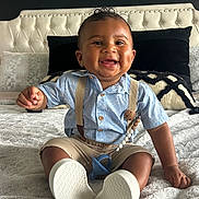 Kingston joined the competition — help win amazing prizes! baby, child, smiling, sitting, bed, clothing, suspenders, shorts, shirt, footwear, pillow, headboard, indoor, happy, drool, furniture, cute, portrait, person, home