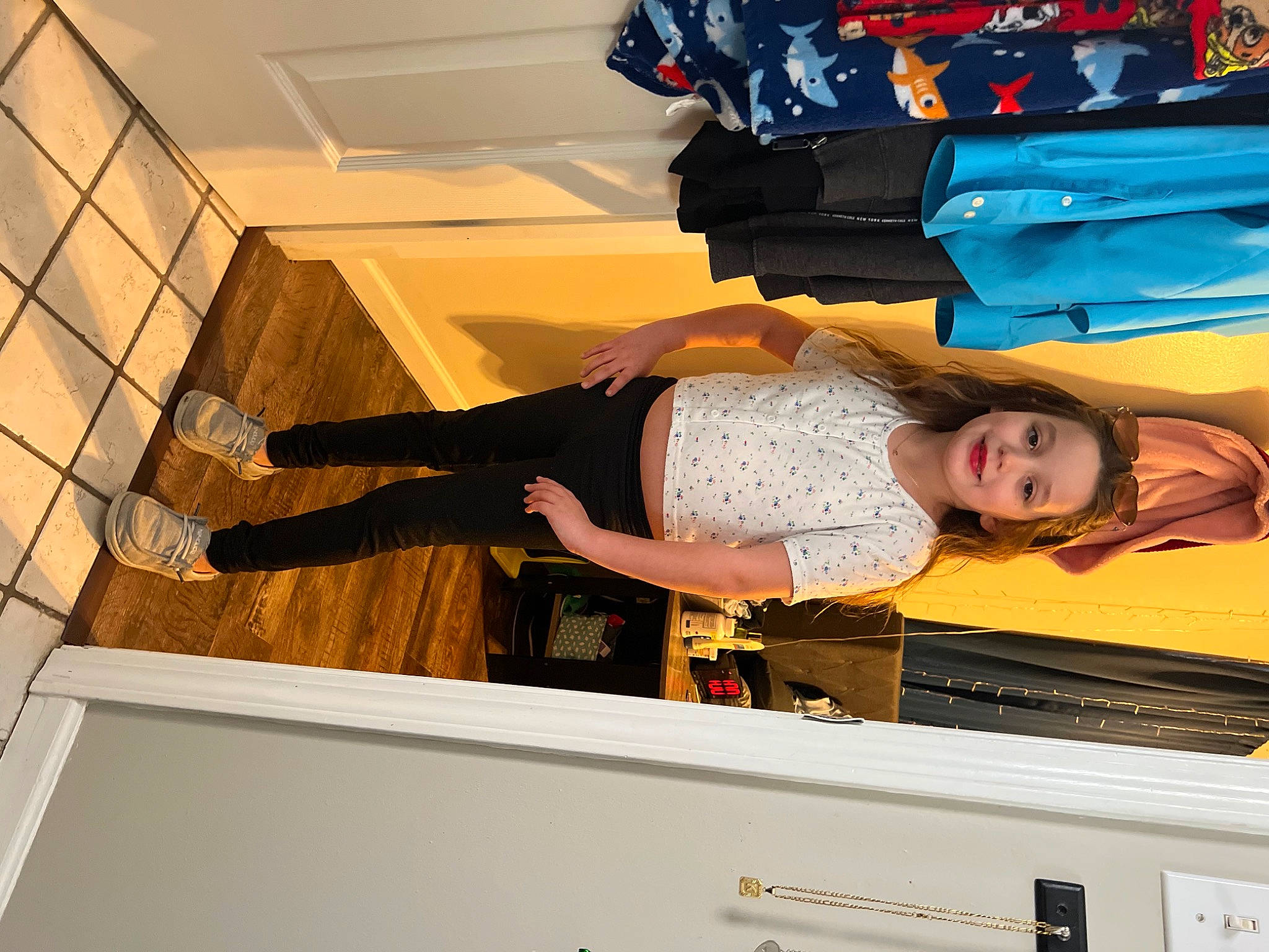 Mckenzie joined the competition — help win amazing prizes! ceiling, comfort, elbow, fashion_design, fun, human_leg, joy, line, machine, pattern, person, room, sleeve, t_shirt, thigh, waist, wood, wrist