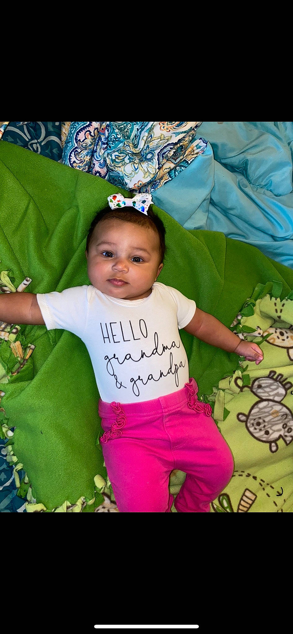 Amariana is registered to the contest to win money with this photo: adaptation, arm, baby, baby_toddler_clothing, cool, facial_expression, finger, fun, grass, hairstyle, happy, leisure, magenta, person, pink, purple, skin, sleeve, t_shirt, textile