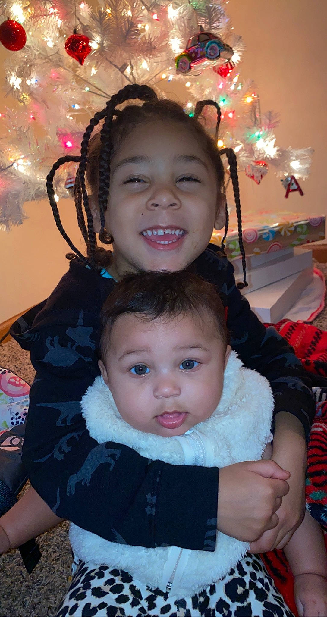 Amariana joined the competition — help win amazing prizes! black, cheek, chin, christmas_ornament, eye, face, facial_expression, hairstyle, happy, head, human, iris, organ, people_in_nature, person, photograph, skin, smile, standing, toddler