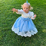 Angel joined the competition — help win amazing prizes! bodypart, child, clothing, costume, dress, face, fashion, female, finger, formalwear, girl, gown, grass, head, lawn, outdoors, person, photography, plant, portrait