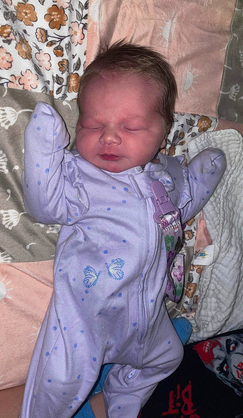 Mariana joined the competition — help win amazing prizes! baby, baby_products, baby_toddler_clothing, bib, cheek, child, comfort, electric_blue, eye, head, iris, linens, mouth, pattern, person, purple, sitting, skin, sleeve, textile