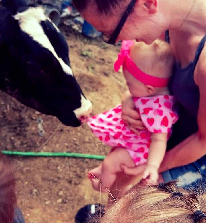 Eliana is registered to the contest to win money with this photo: baby, beauty, child, fawn, grass, hair, happy, head, human_leg, leg, light, organ, person, photograph, pink, shorts, snapshot, summer, thigh, toddler