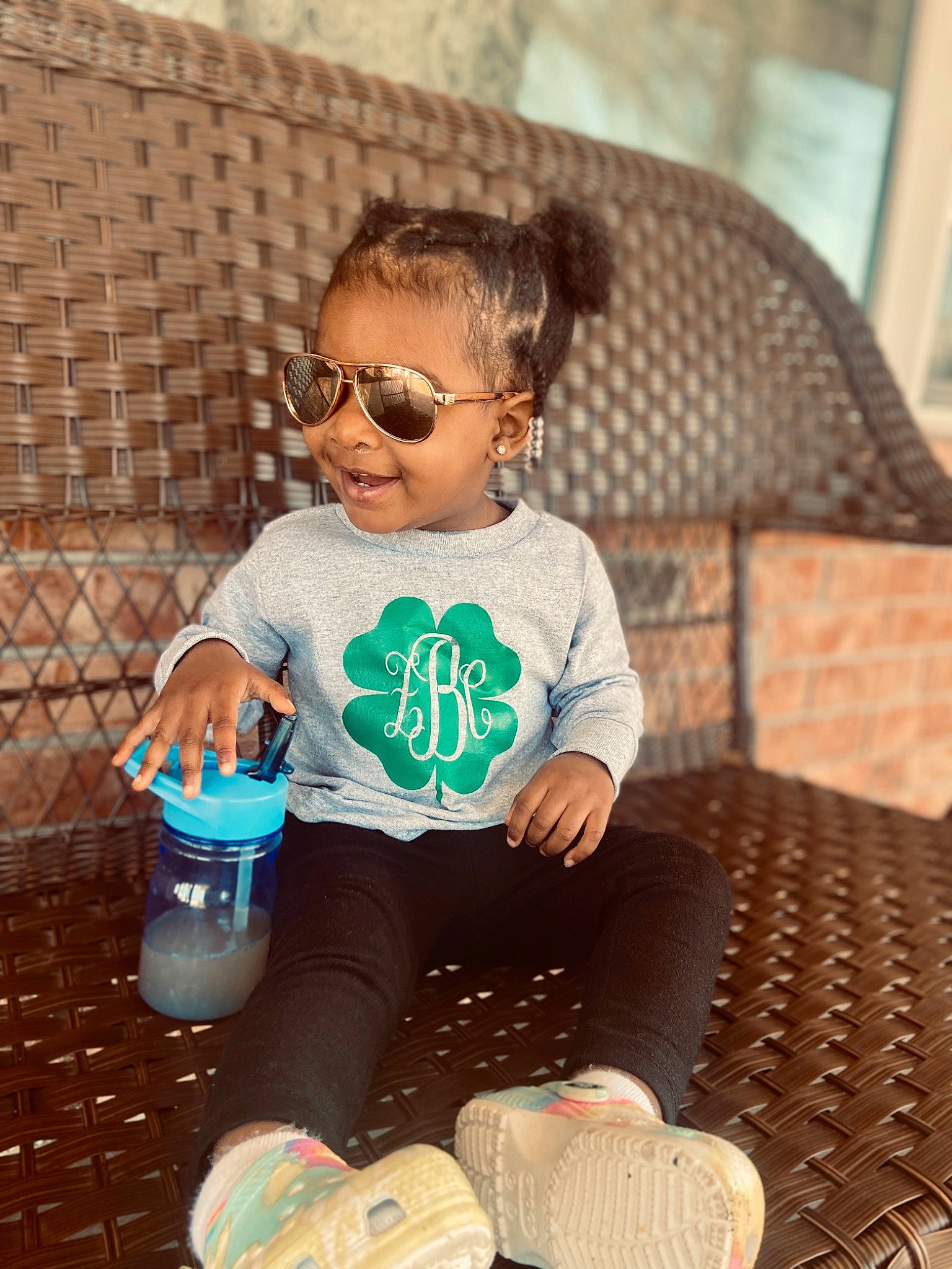 Zariya is registered to the contest to win money with this photo: baby_toddler_clothing, beauty, child, cool, electric_blue, eyewear, fun, goggles, hairstyle, happy, leisure, pattern, person, plastic_bottle, product, sitting, smile, sunglasses, toddler, vision_care