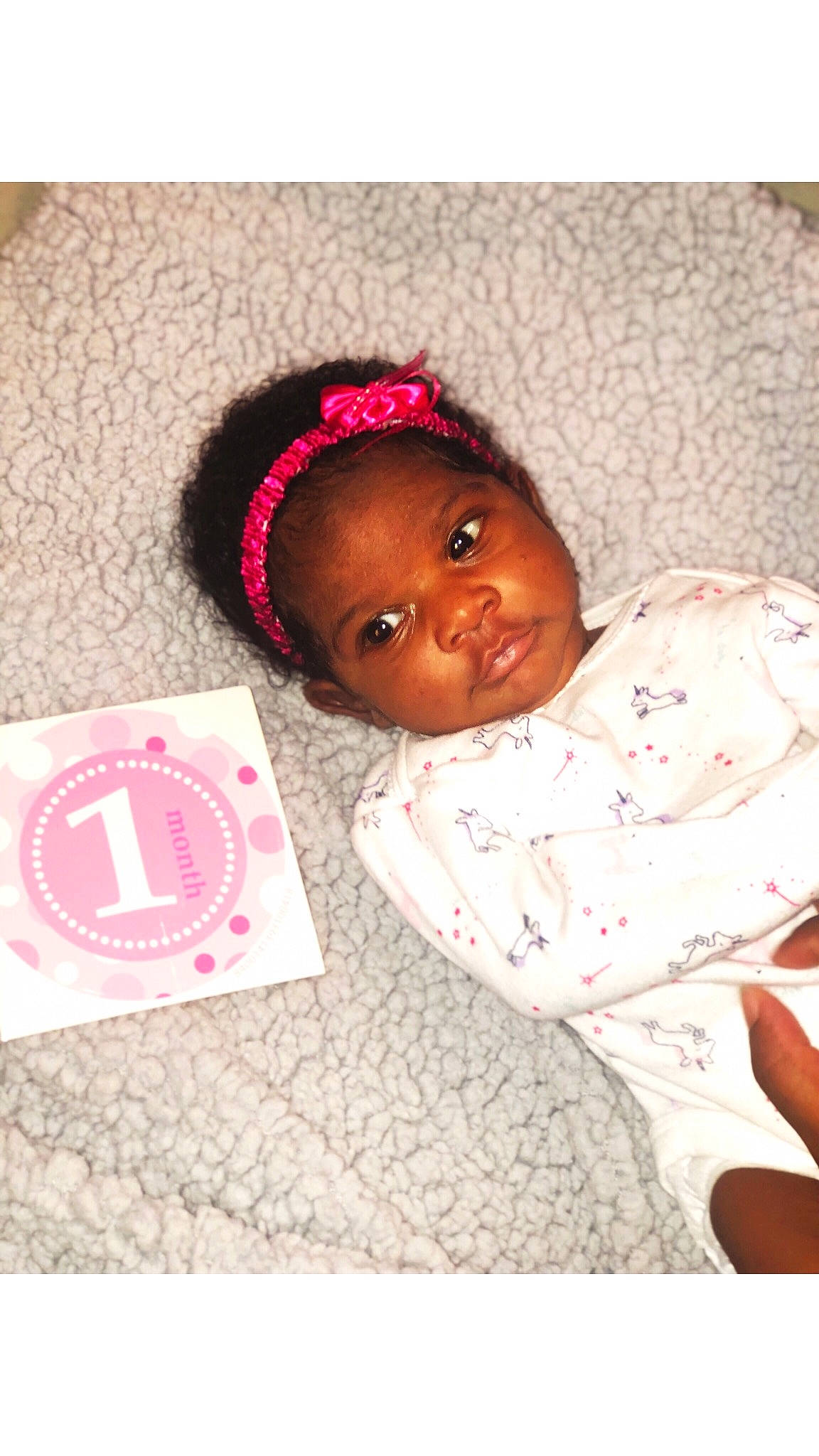 Zariya is registered to the contest to win money with this photo: baby, baby_products, baby_toddler_clothing, child, hair_accessory, headband, headgear, person, pink, toddler