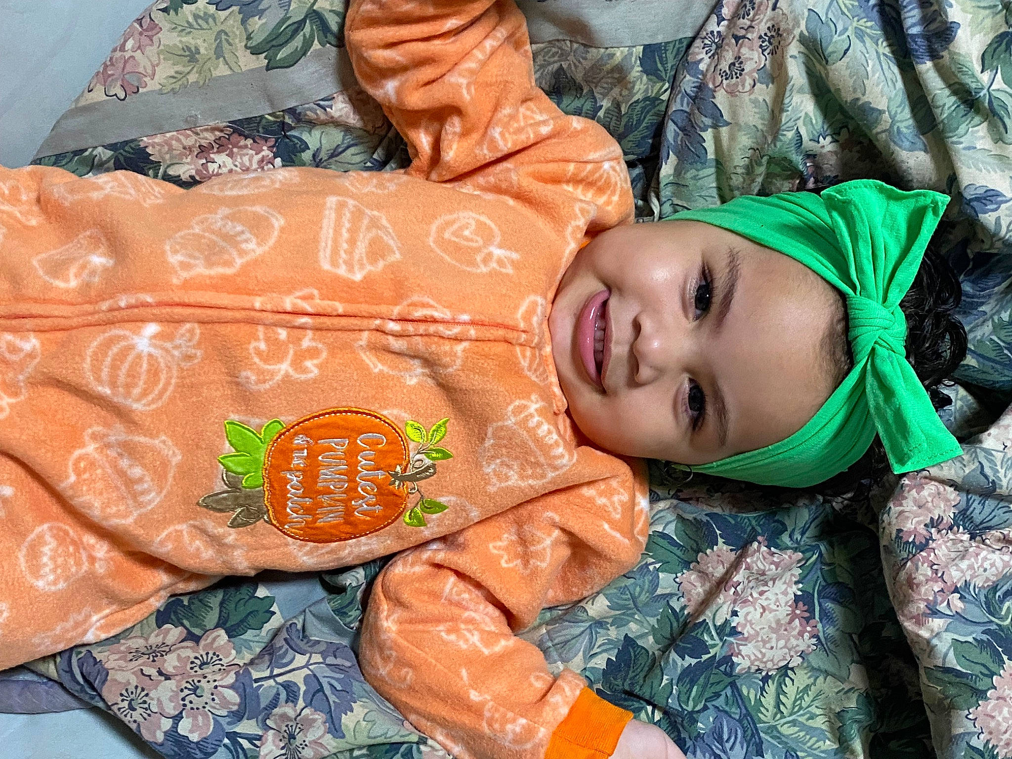 Heaven is registered to the contest to win money with this photo: child, event, face, fun, happy, head, headwear, joy, laugh, orange, pattern, peach, people_in_nature, person, portrait_photography, skin, sleeve, smile, textile, toddler