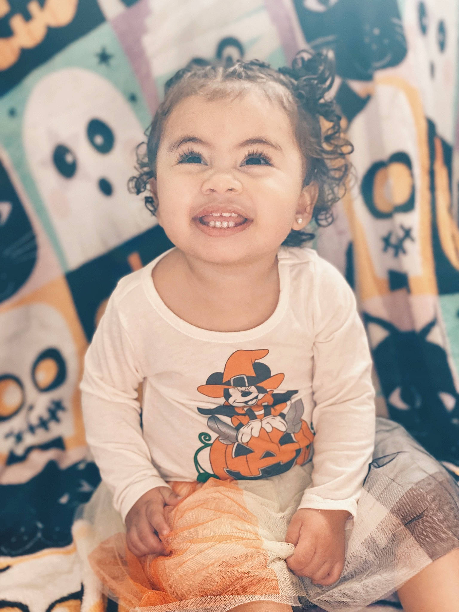 Heaven is registered to the contest to win money with this photo: baby, baby_toddler_clothing, cheek, child, event, facial_expression, fun, hairstyle, happy, head, human, iris, joy, pattern, person, sitting, skin, sleeve, smile, t_shirt