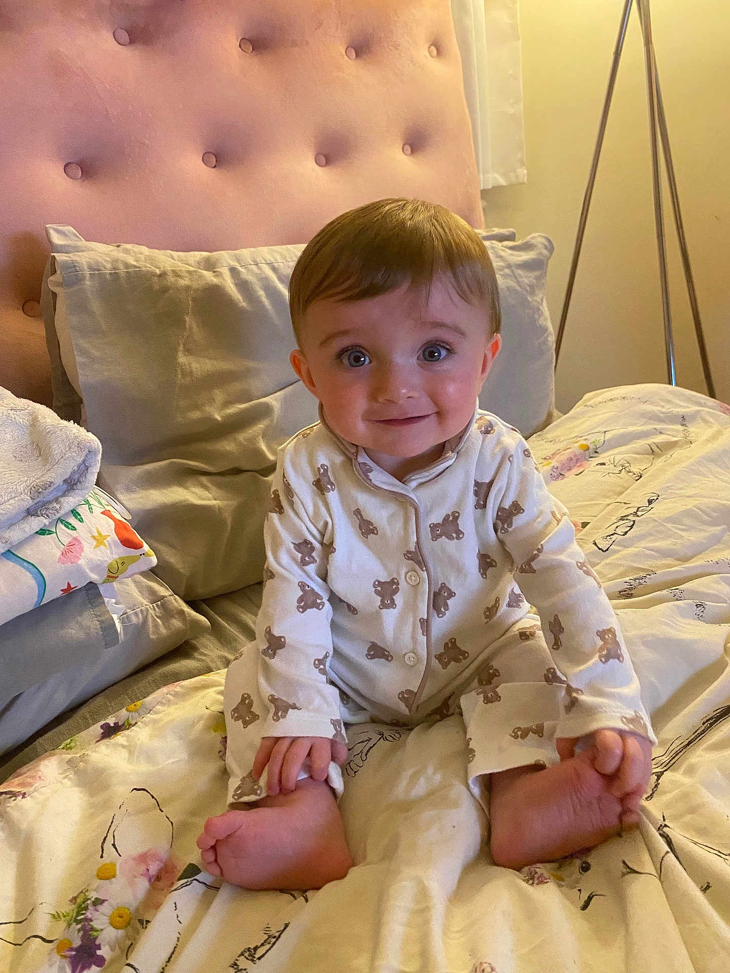 Thomas joined the competition — help win amazing prizes! baby, child, pajamas, bed, pillow, blanket, foot, hand, smile, face, indoors, lamp, headboard, curtain, sleepwear, cute, sitting, person, infant, cozy
