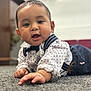 baby, child, crawling, carpet, face, hands, clothing, shirt, suspenders, bow_tie, indoors, portrait, cute, happy, smiling, infant, person, young_child, focus, background_blur