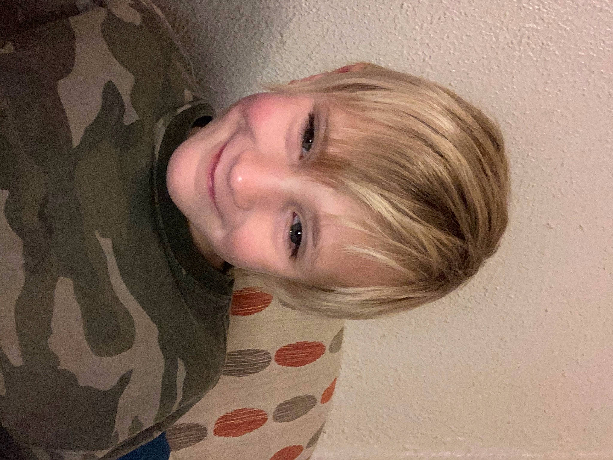 Silas is registered to the contest to win money with this photo: brown_hair, camouflage, cheek, eye, eyelash, face, facial_expression, hairstyle, happy, head, jaw, joy, lip, mammal, military_camouflage, neck, nose, person, skin, sleeve