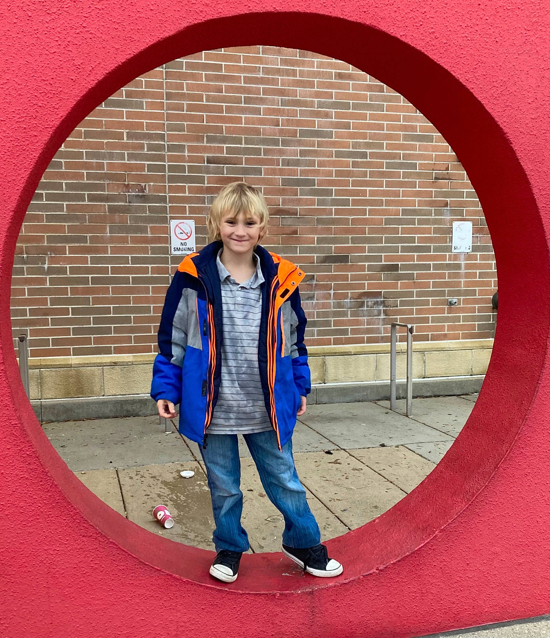 Silas joined the competition — help win amazing prizes! beauty, brick, brickwork, carmine, circle, composite_material, denim, electric_blue, fixture, jeans, joy, line, outerwear, pattern, person, photograph, red, sleeve, smile, symmetry